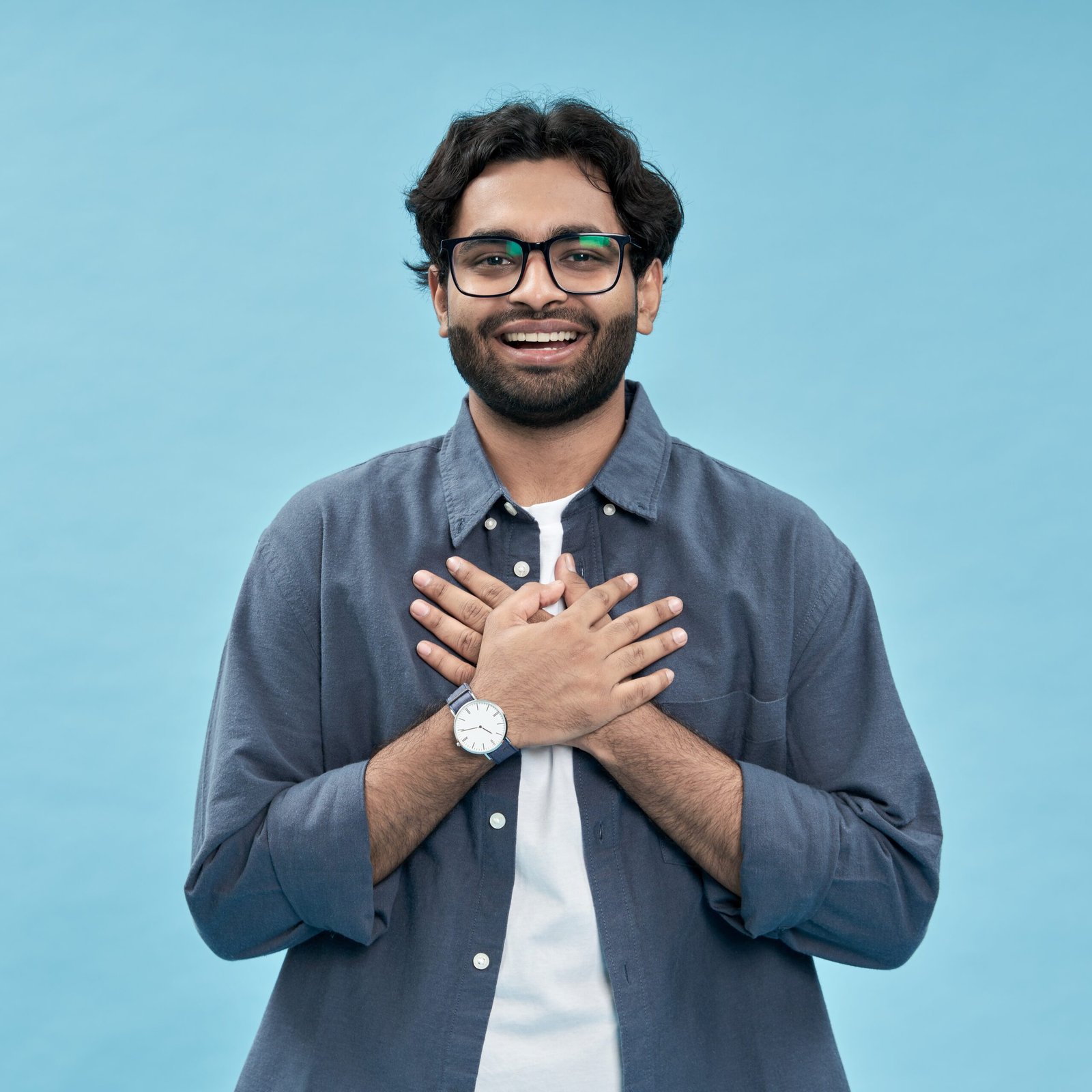 cropped grateful happy arab man holding hands on chest iso 2025 02 11 16 16 04 utc scaled