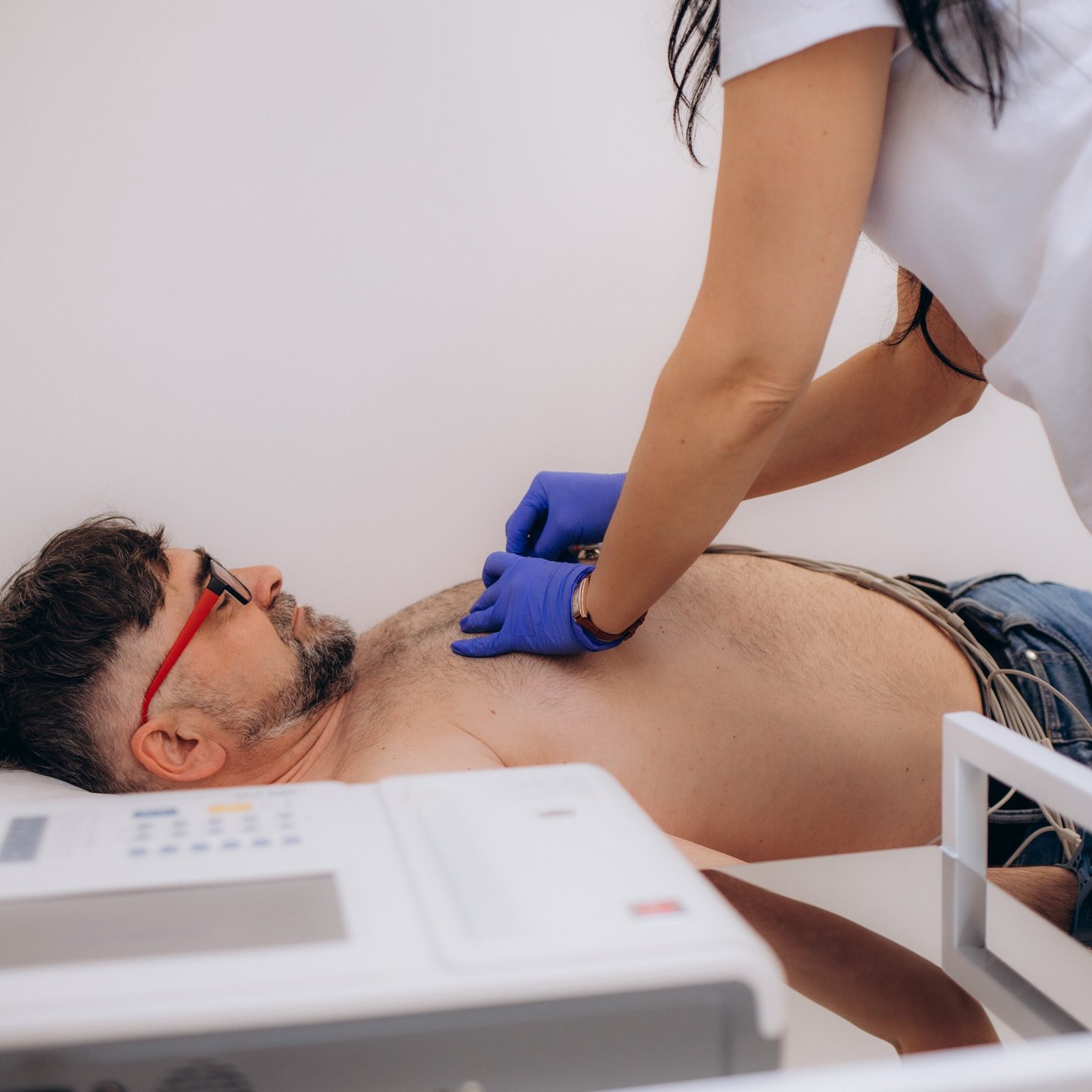 cropped doctor cardiologist is attaching vacuum sensors to 2025 03 14 18 38 11 utc scaled